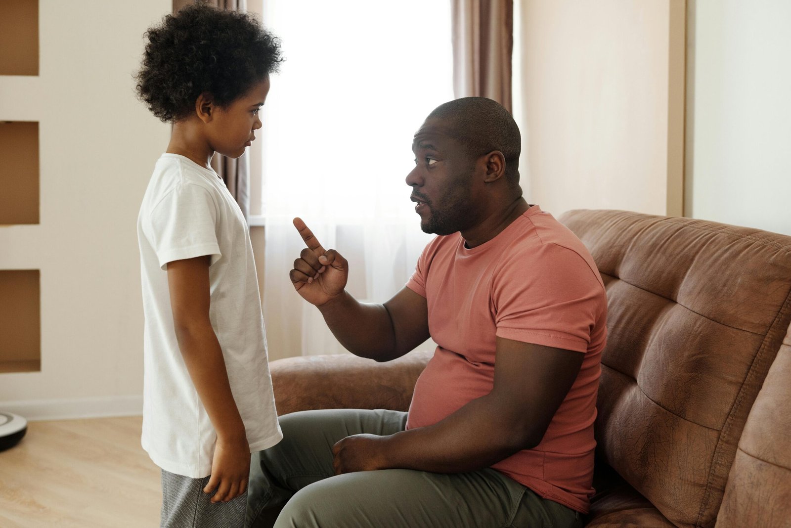 A child receiving a reprimand